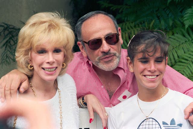 <p>Getty</p> From left: Joan Rivers, Edgar Rosenberg and Melissa Rivers in 1986