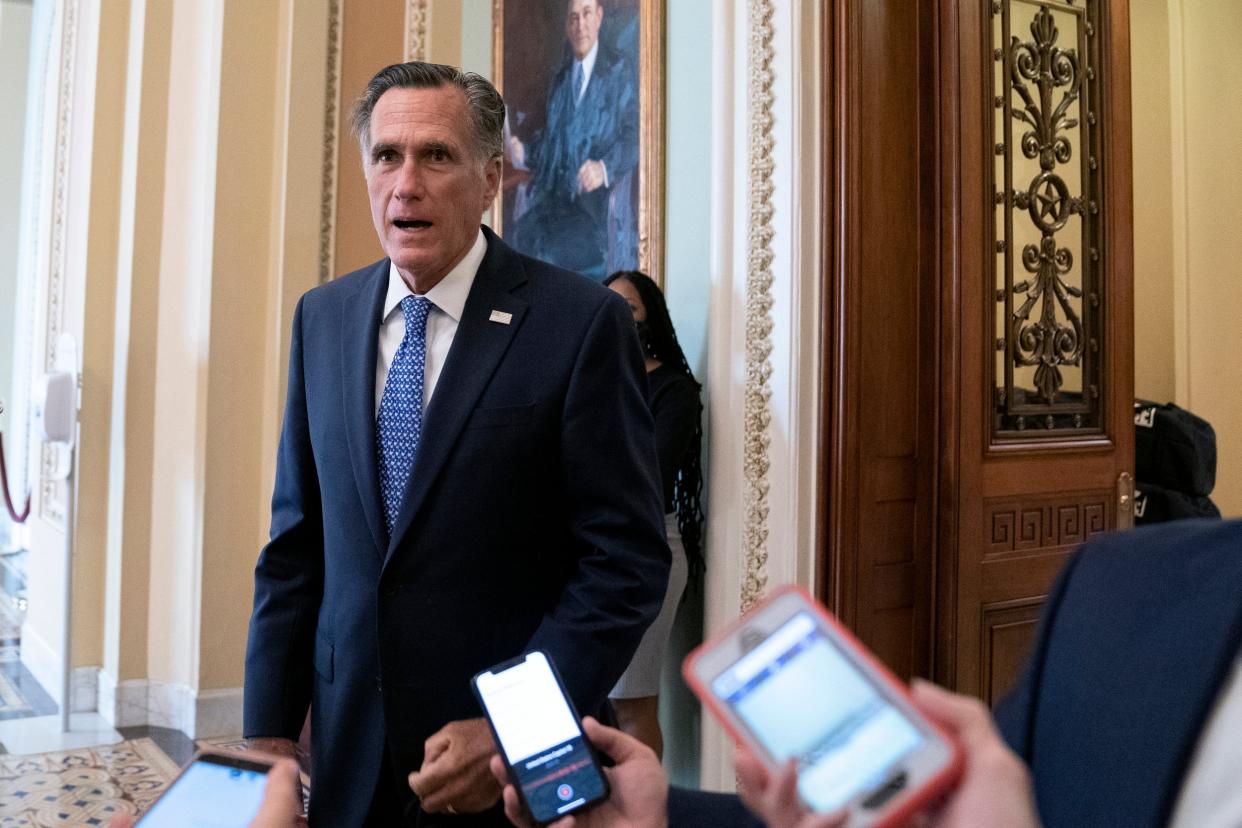 Romney tells reporters he intends to back the vote: Getty Images