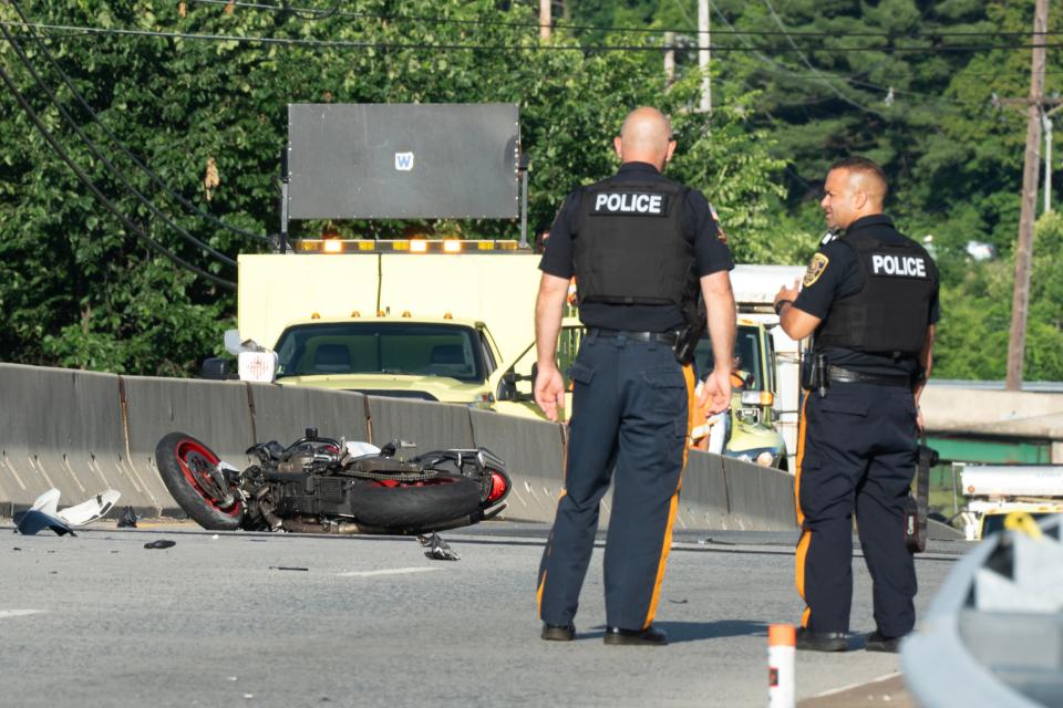 Clifton Police investigate an accident between a motorcycle and a box truck on the westbound lanes on Route 46 at Paulison Ave in Clifton, NJ on Monday June 24, 2024. All westbound lanes of traffic was closed on Route 46 and the left lane was closed on the eastbound side of the highway during Monday morning's rush hour.