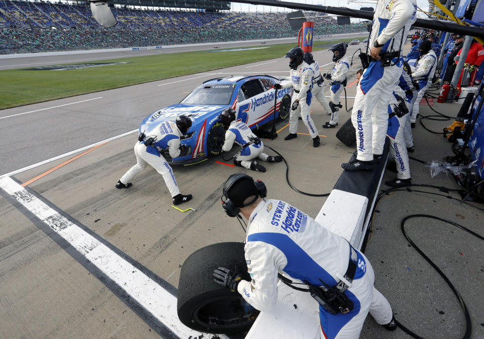 Kyle Larson stops on Pit Road for a tire change during a NASCAR Cup Series auto race at Kansas Speedway in Kansas City, Kan., Sunday, May 5, 2024. (AP Photo/Colin E. Braley)
