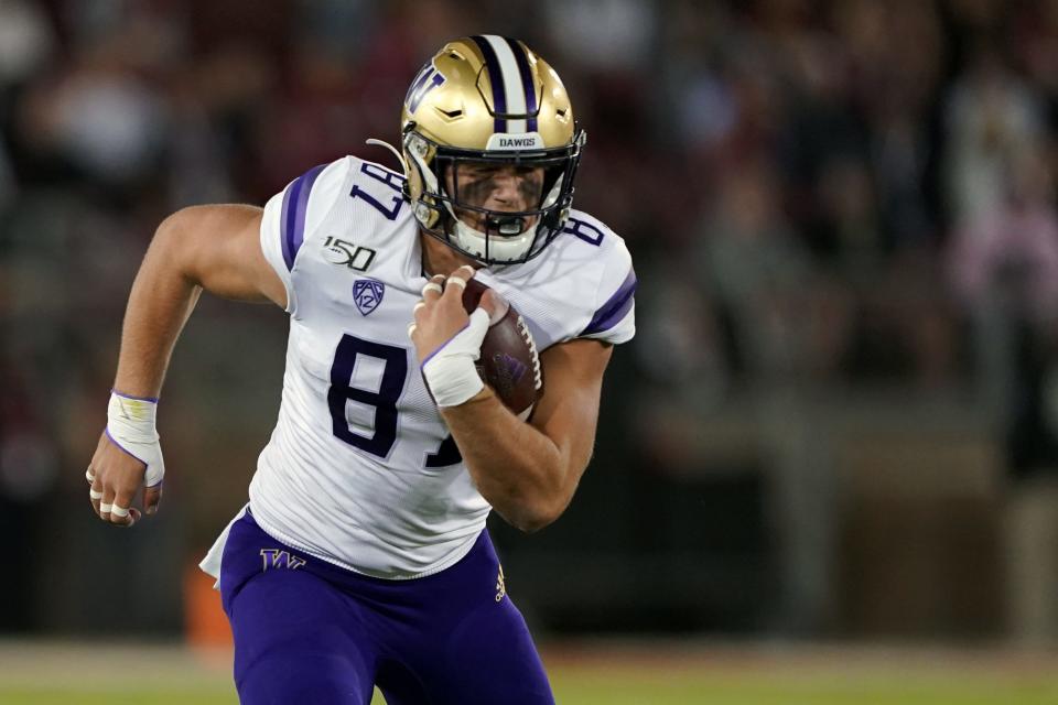 Oct 5, 2019; Stanford, CA, USA; Washington Huskies tight end Cade Otton (87) runs after a catch for a first down during the second quarter against the Stanford Cardinal at Stanford Stadium. Mandatory Credit: Darren Yamashita-USA TODAY Sports