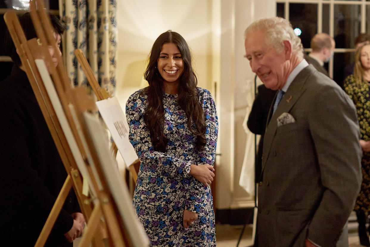 Charles with modern artisan Isabelle Pennington-Edmead looking at the collection (Charlie Urmston/Yoox Net-A-Porter/PA)