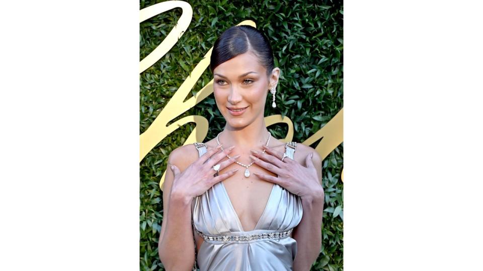  Bella Hadid wears Chopard jewellery to the Chopard vening at the 77th annual Cannes Film Festival