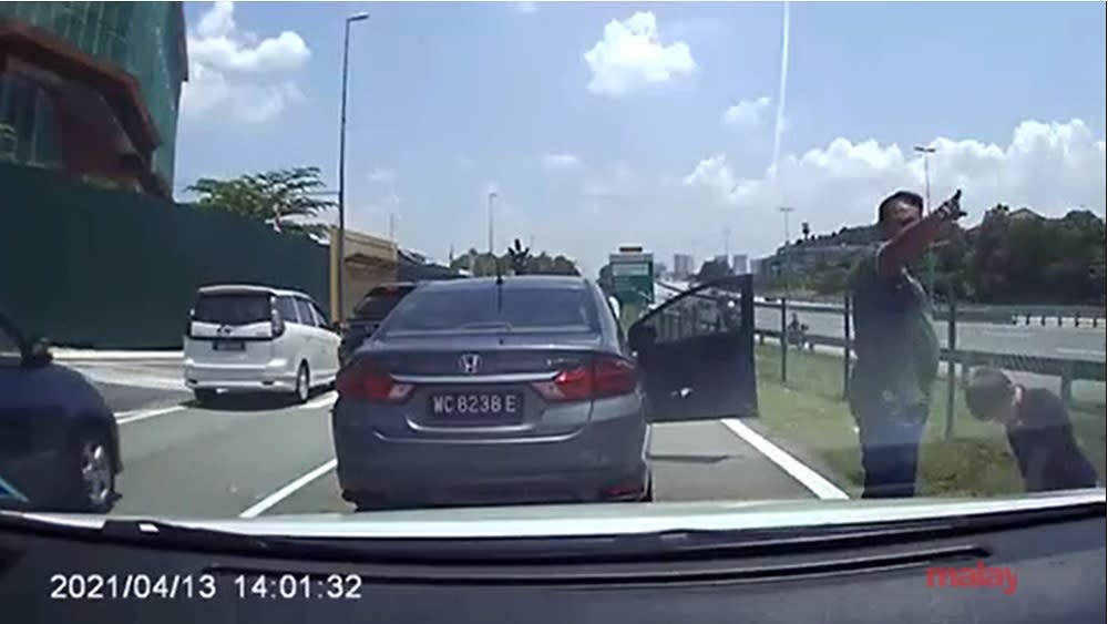 A road user’s dash cam captured the carjacking incident. — Screen capture via Twitter