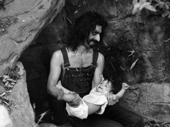 Zappa poses for a portrait with daughter Moon Unit in February 1968 (Getty)