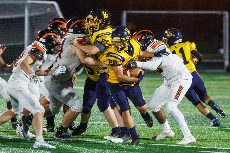 Littlestown's Logan Conaway (20) pushes through the Hanover defense during the second half of a football game between the Hanover Nighthawks and Littlestown Thunderbolts, Saturday, Sept. 17, 2022, in Littlestown Borough. Littlestown defeated Hanover 50-6.