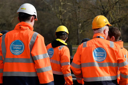 Thames Water operatives are seen at a water distribution site in Hampstead in London, Britain, March 5, 2018. REUTERS/Toby Melville