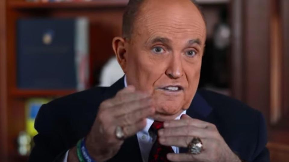 giuliani orange face gray hands