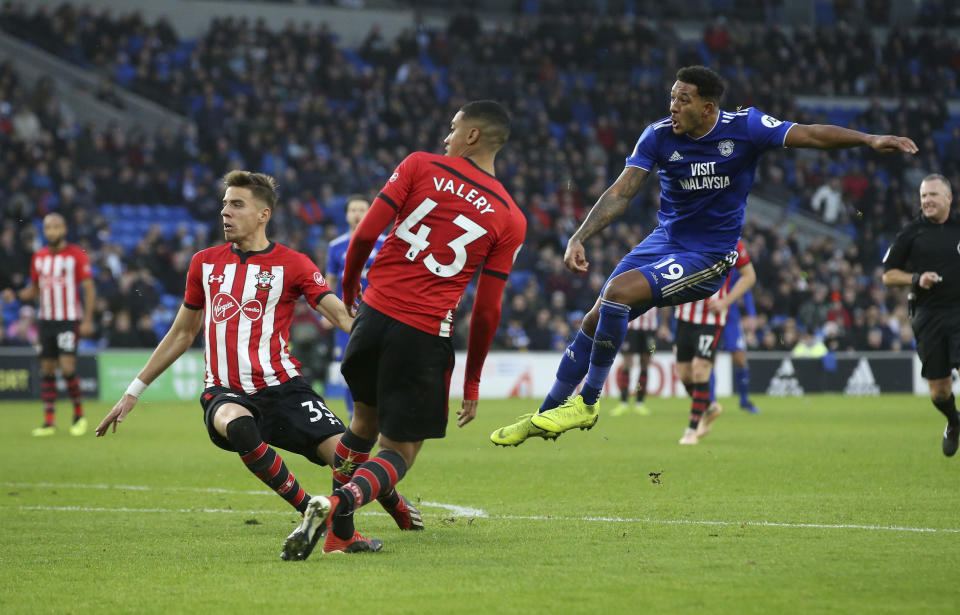Cardiff City's Nathaniel Mendez-Laing, centre right, takes a shot, during the English Premier League match between Cardiff City and Southampton at the Cardiff City Stadium, in Cardiff, Wales, Saturday Dec. 8, 2018. (Mark Kerton/PA via AP)