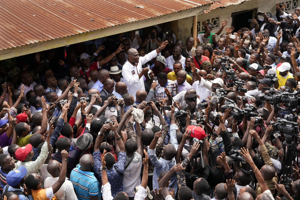 Spurned Congo opposition candidate Martin Fayulu addresses supporters in Kinshasha, Congo, Friday, Jan. 11, 2019. Hundreds gathered to denounce what they called "the people's stolen victory" in the presidential election. (AP Photo/Jerome Delay)