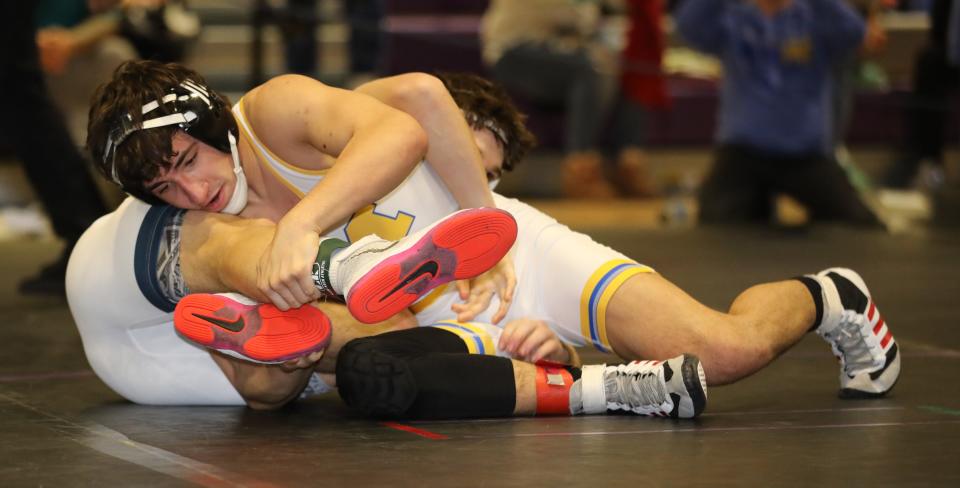 Robert DeMauro from Mahopac on his way to defeating Jonathan Granito from Huntington in the 138 pound weight class, during the 2024 Murphy-Guccione Shoreline Wrestling Classic at New Rochelle High School, Jan. 6, 2024.