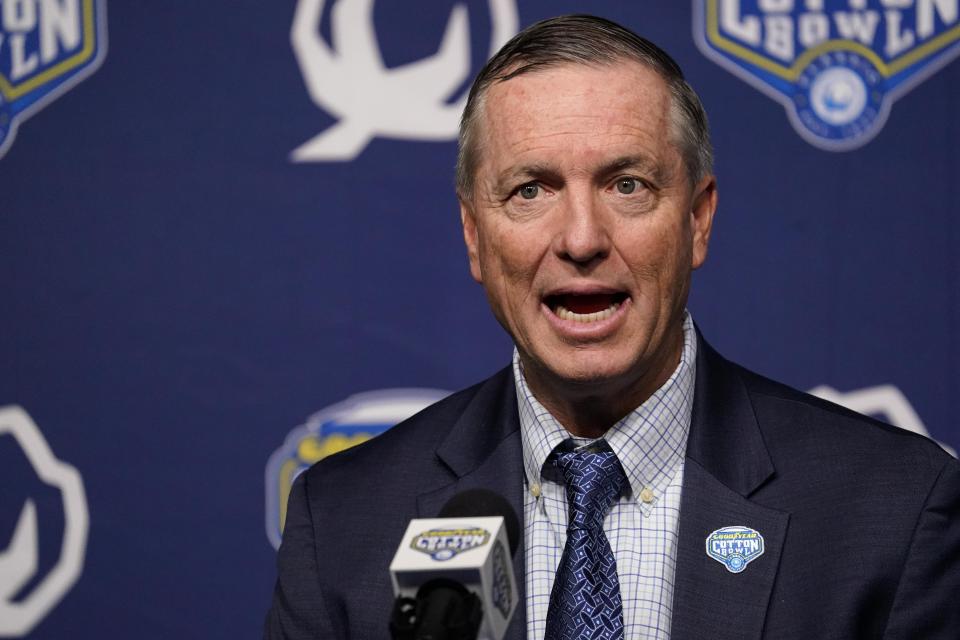 Tulane head coach Willie Fritz speaks at a press conference ahead of the Cotton Bowl NCAA college football game, Sunday, Jan. 1, 2023, in Dallas, Texas. Tulane will face Southern California in the Cotton Bowl on Monday, Jan. 2. (AP Photo/Sam Hodde)