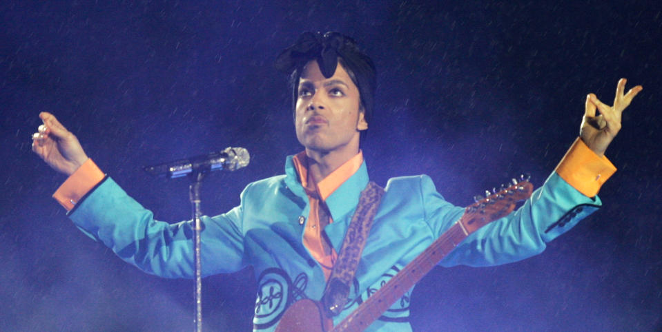 Prince’s 2007 Super Bowl halftime show, which included him singing “Purple Rain” in the rain, is ranked by many to be the best of all time. (Photo: AP Images).