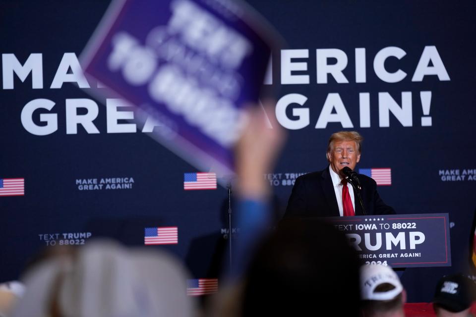 Former President Donald Trump speaks during a commit to caucus rally, Wednesday, Dec. 13, 2023, in Coralville, Iowa. (AP Photo/Charlie Neibergall)