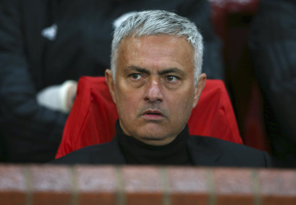 FILE - In this Tuesday, Oct. 23, 2018. file photo, Manchester United coach Jose Mourinho sits on the bench during the Champions League group H soccer match between Manchester United and Juventus at Old Trafford, Manchester, England. Manchester United announced Tuesday Dec. 18, 2018, Jose Mourinho has left the Premier League club with immediate effect. (AP Photo/Dave Thompson, File)