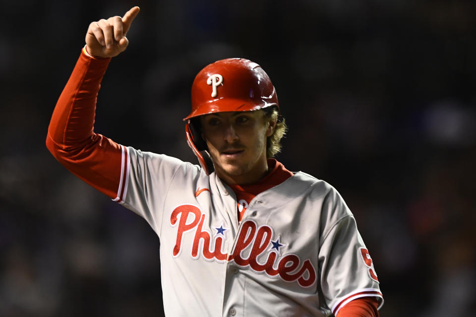 Philadelphia Phillies' Bryson Stott celebrates after scoring on a Bryce Harper double during the sixth inning of the team's baseball game against the Chicago Cubs on Tuesday, Sept. 27, 2022, in Chicago. (AP Photo/Paul Beaty)