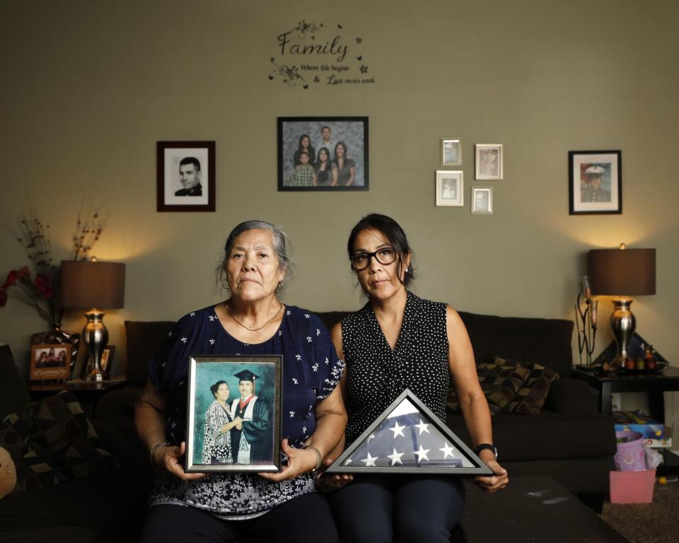 Maria Noriega and her daughter Sonia Jimenez sit in their home in San Diego