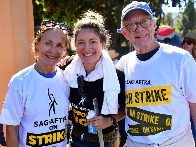 <p>London Entertainment/Shutterstock</p> Laurie Metcalf, Zoe Perry and Jeff Perry seen on the SAG /AFTRA Strike pIcket line outside of Walt Disney Studios in Burbank, California on October 16, 2023.