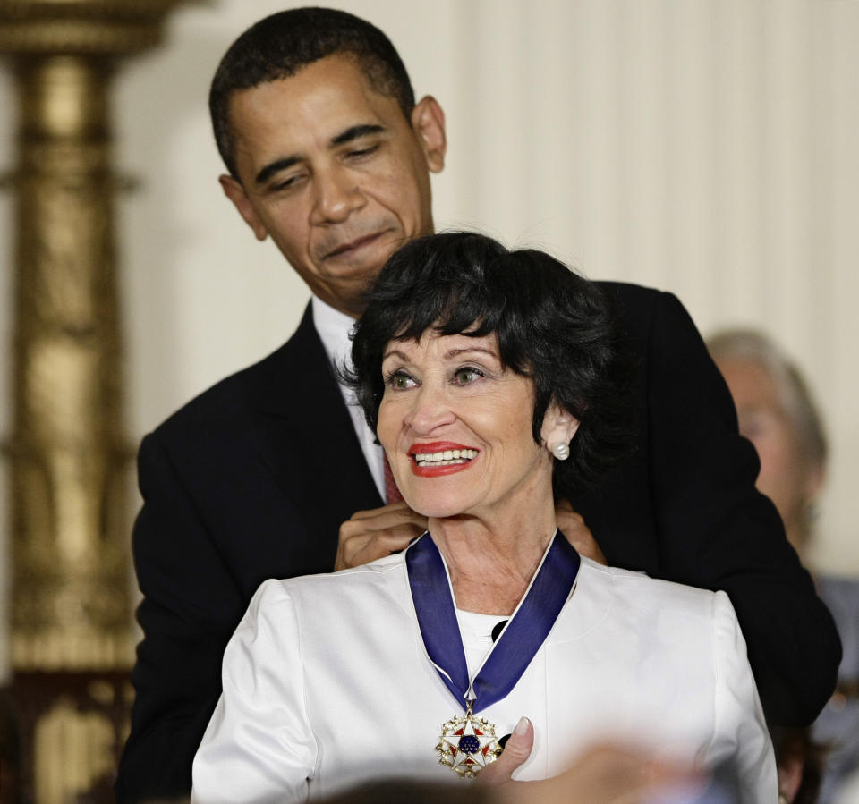 FILE - President Barack Obama presents the 2009 Presidential Medal of Freedom to Chita Rivera at the White House in Washington on Aug. 12, 2009. Rivera, the dynamic dancer, singer and actress who garnered 10 Tony nominations, winning twice, in a long Broadway career that forged a path for Latina artists, died Tuesday. She was 91. (AP Photo/J. Scott Applewhite, File)