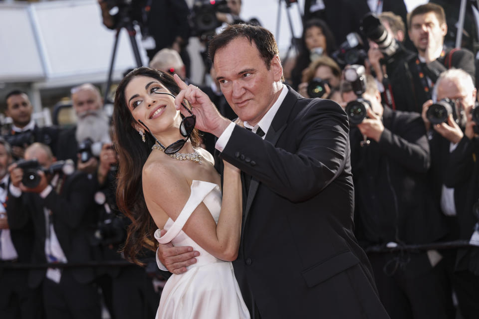 Daniella Pick, left, and Quentin Tarantino pose for photographers upon arrival at the awards ceremony during the 76th international film festival, Cannes, southern France, Saturday, May 27, 2023. (Photo by Vianney Le Caer/Invision/AP)