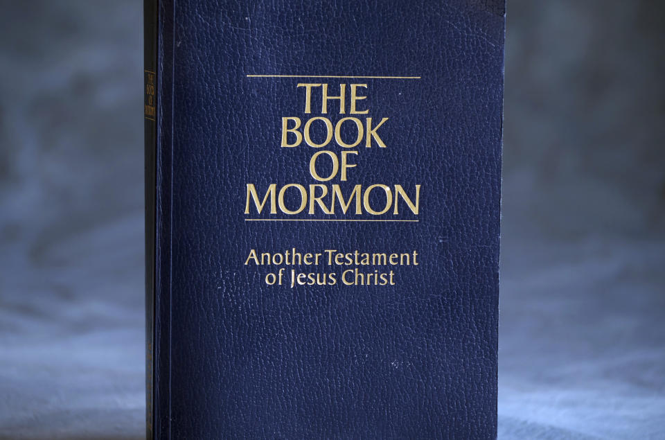 The Book of Mormon is shown Tuesday, Aug. 21, 2018, Salt Lake City. Sheraton, Westin and other Starwood hotels are finding their religion. Marriott International, which bought Starwood two years ago, has begun putting copies of the Bible and the Book of Mormon in Sheratons, Westins and other hotels in the Starwood family. (AP Photo/Rick Bowmer)