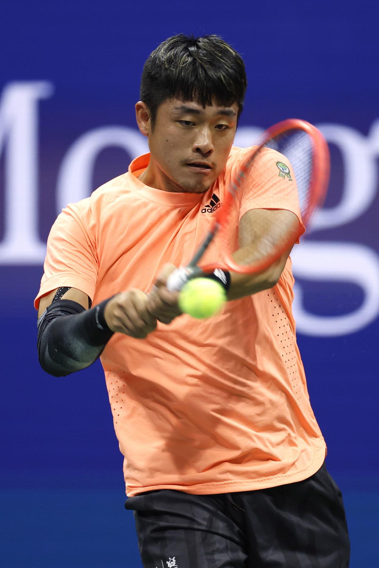 Yibing Wu of China plays a backhand against Daniil Medvedev during their Men's Singles Third Round match on Day 5 of the 2022 U.S. Open at USTA Billie Jean King National Tennis Center on Sept. 02, 2022, in Flushing, Queens.