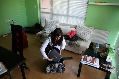 Bulgarian Teodora Yolcheva, 31, a public relations professional, prepares her luggage prior to her departure to London, in Sofia, Bulgaria, March 22, 2017. Picture taken March 22, 2017. REUTERS/Stoyan Nenov