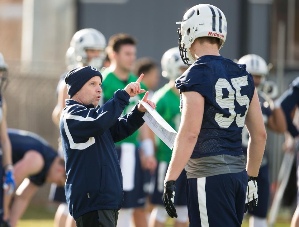 BYU tight ends coach Steve Clark instructs during spring camp in Provo.