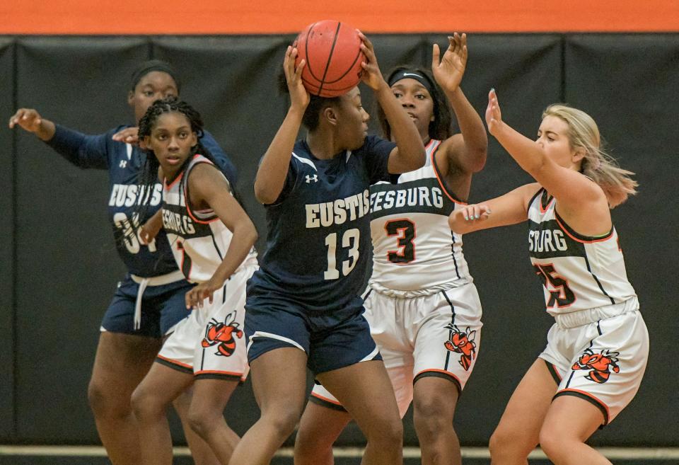 Eustis' Cerina Rolle (13) attracts a crowd during a 2019 game against Leesburg at the Hive in Leesburg. Rolle has signed a National Letter of Intent with Florida Gulf Coast University in Fort Myers. [PAUL RYAN / CORRESPONDENT]