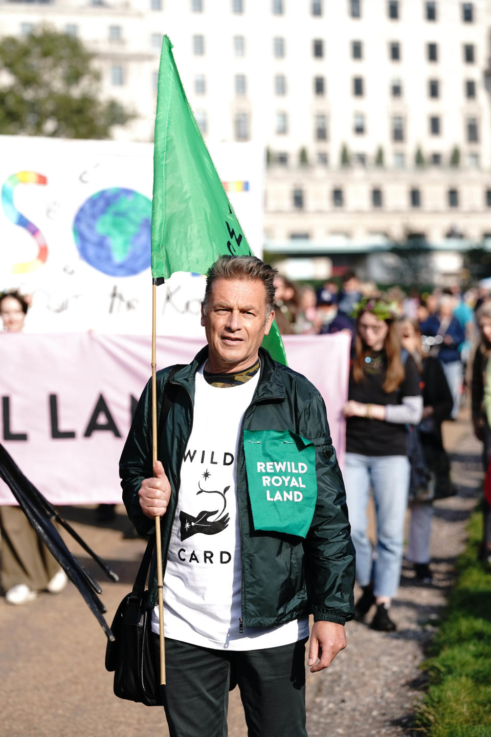 Wildlife expert Chris Packham and more than 100 children deliver a Wild Card campaign petition  signed by 100,000, to Buckingham Palace, London, calling on the royal family to re-wild their estates. Picture date: Saturday October 9, 2021. (Photo by Jonathan Brady/PA Images via Getty Images)