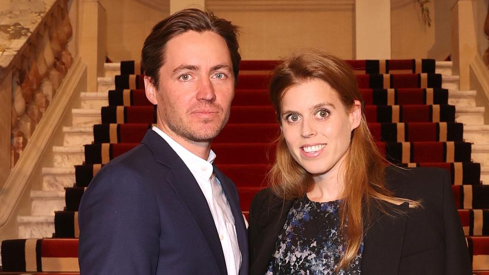 Edoardo Mapelli Mozzi and Princess Beatrice in front of staircase