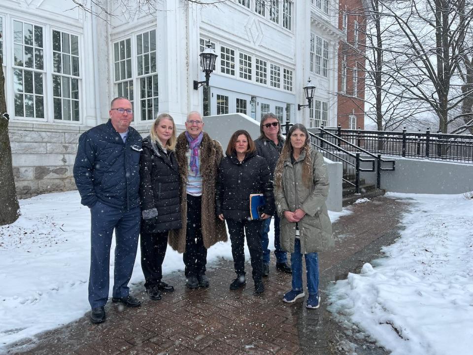 From left to right, Rene and Pamela Langevin, Liz Saunders, Mirella Cortese-Burt, Kim Burt and Laurie Baker. All victims, save for Laurie Baker's case, were connected to the charges laid against Scott Eisemann. Eisemann pleaded guilty to defrauding all of them in a string of cottage renovation projects except Laurie.