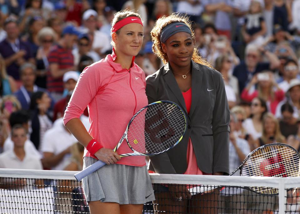 Serena Williams of the U.S. and Azarenka of Belarus pose ahead of their women's singles final match at the U.S. Open tennis championships in New York