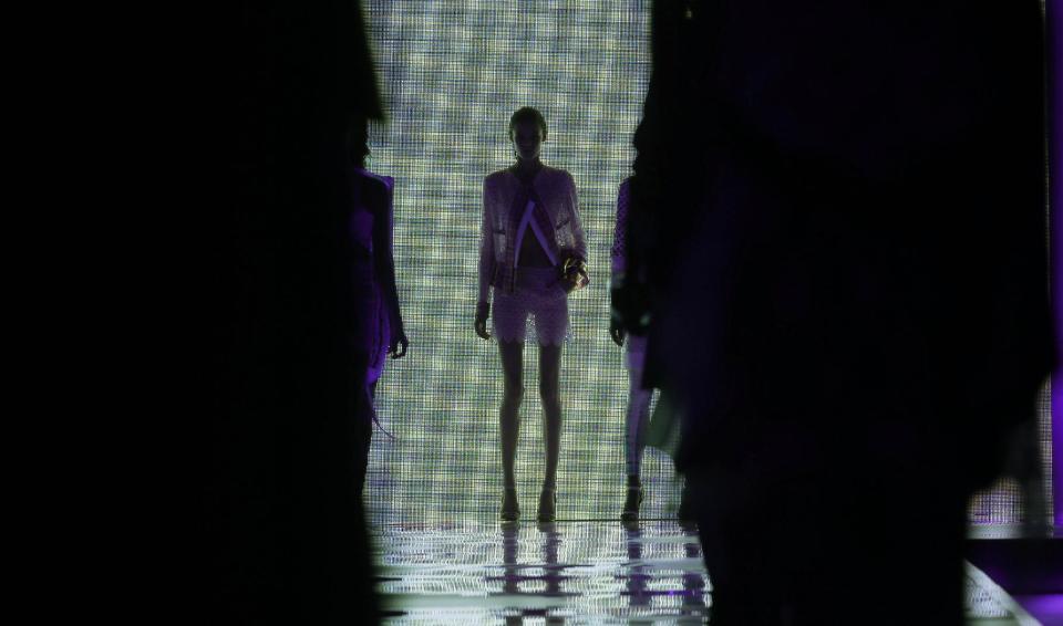 A model wears a creation for Just Cavalli women's Spring-Summer 2014 collection, part of the Milan Fashion Week, unveiled in Milan, Italy, Thursday, Sept. 19, 2013. (AP Photo/Luca Bruno)