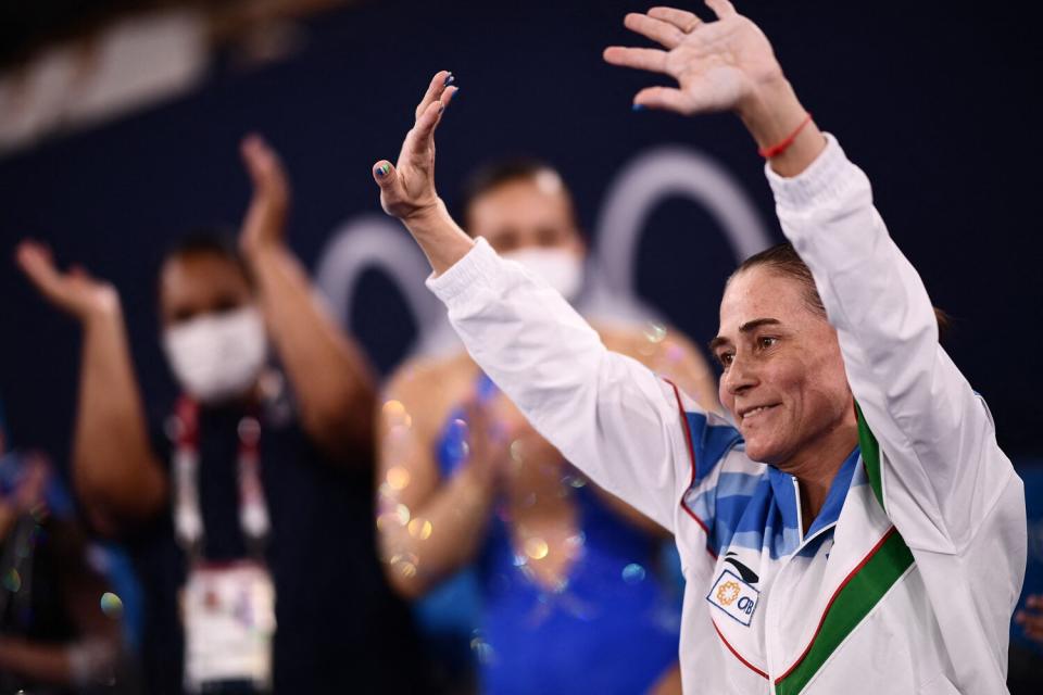 Uzbekistan's Oksana Chusovitina reacts after competing in the artistic gymnastics vault