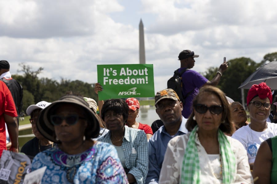 Demonstrators march on the 60th anniversary of the March on Washington and Martin Luther King Jr.’s historic ‘I Have a Dream’ speech at the Lincoln Memorial in Washington D.C., United States, on Aug. 26, 2023. (Photo by Mostafa Bassim/Anadolu Agency via Getty Images)