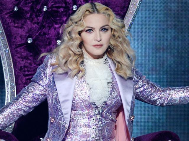 Madonna Takes a Topless Selfie with a Louis Vuitton Bag