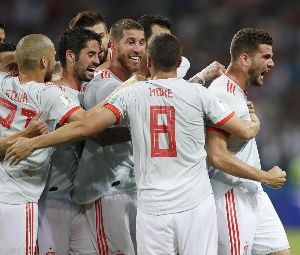 <p>From zero to hero: Nacho atones for conceding a penalty by putting Spain in the lead 3-2. (AP) </p>