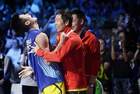 China's Chen Long reacts after winning the men's singles final against Malaysia's Lee Chong Wei at the Badminton World Championship in Copenhagen August 31, 2014. REUTERS/Liselotte Sabroe/Scanpix Denmark