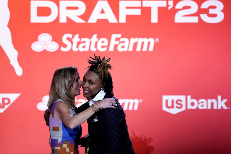 Tennessee's Jordan Horston, right, reacts with commissioner Cathy Engelbert after being selected by the Seattle Storm at the WNBA basketball draft Monday, April 10, 2023, in New York. (AP Photo/Adam Hunger)