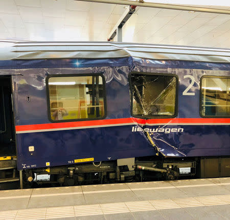 A train is seen after a crash in Salzburg, Austria, April 20, 2018 in this picture obtained from social media. Courtesy CHRISTIAN HENNIG/via REUTERS