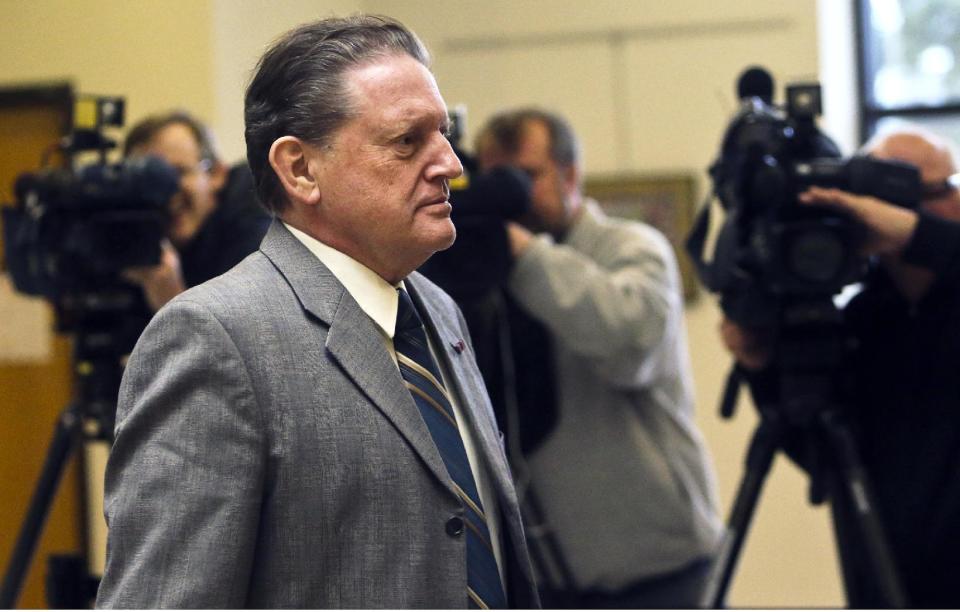 Byron Smith re-enters court before the jury made their ruling at the Morrison County Courthouse, Tuesday, April 29, 2014, in Little Falls, Minn. Smith, who shot and killed 17-year-old Nick Brady and 18-year-old Haile Kifer during a 2012 Thanksgiving Day break-in, was convicted of premeditated murder. The jury took only about three hours to soundly reject his claim of self-defense. (AP Photo/The Star Tribune, David Joles) MANDATORY CREDIT; ST. PAUL PIONEER PRESS OUT; MAGS OUT; TWIN CITIES TV OUT.