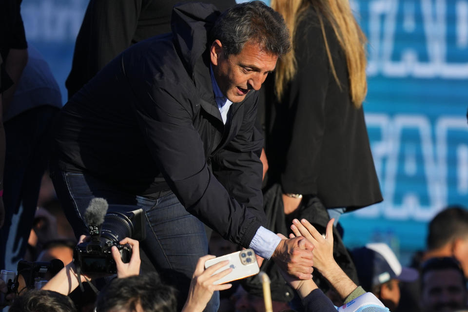 Sergio Massa, Argentine Economy Minister and presidential candidate for the ruling party, greets supporters during a campaign event in Buenos Aires, Argentina, Tuesday, Oct. 17, 2023. General elections are set for Oct. 22. (AP Photo/Natacha Pisarenko)