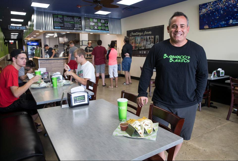 Co-founder Paul Altero stands in the dining area of Bubbakoo's Burritos in Howell, New Jersey.