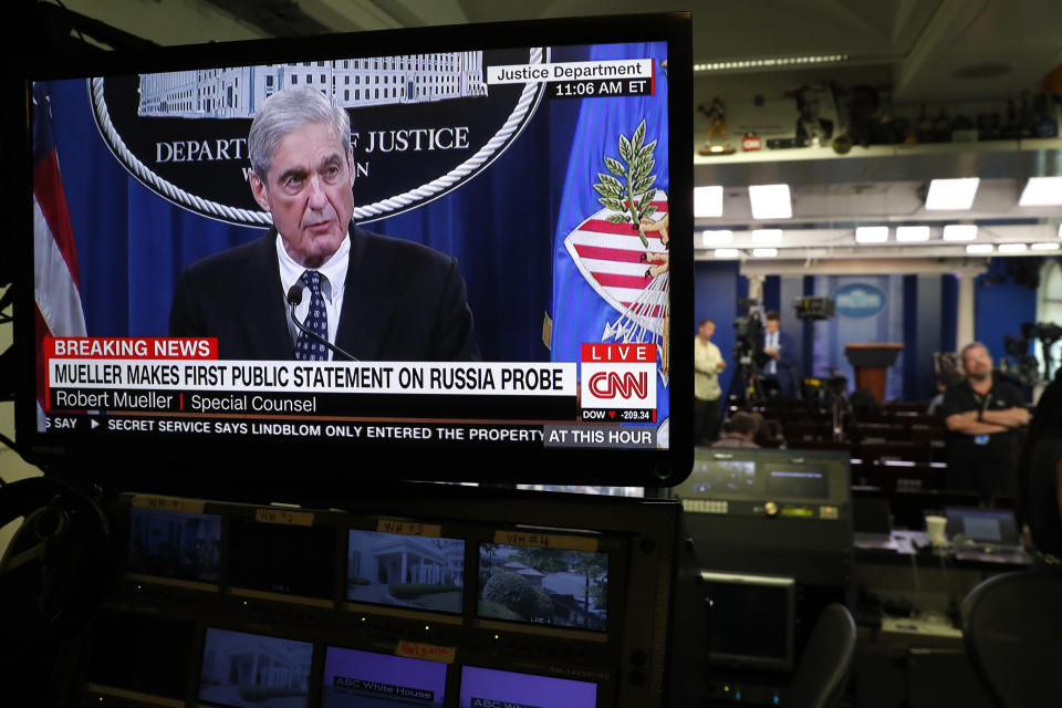 Television screens in the briefing room of the White House show a live statement from special counsel Robert Mueller as he speaks at the Justice Department, Wednesday May 29, 2019, in Washington. (AP Photo/Jacquelyn Martin)