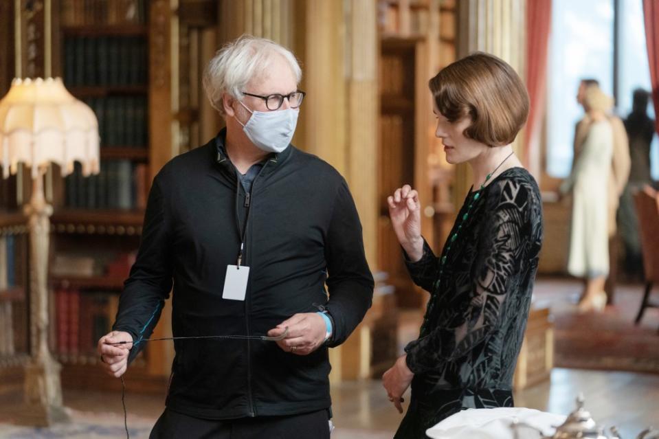 Director Simon Curtis and star Michelle Dockery on the set of “Downton Abbey: A New Era.” Focus Features/Courtesy Everett Collection