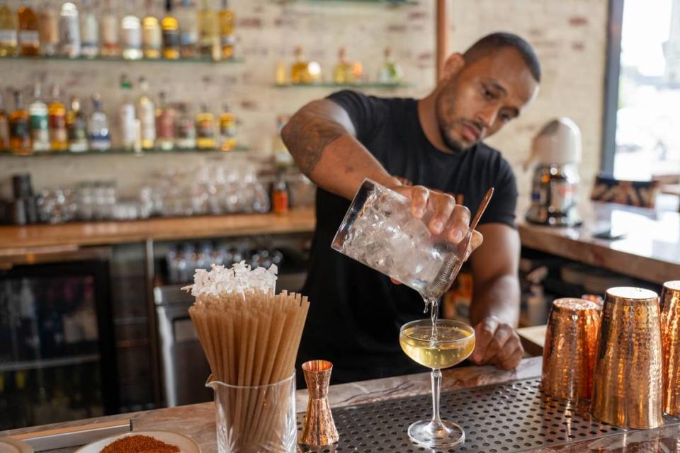 Bar director Michah Yarbrough makes a Del Rio cocktail at Puerta.