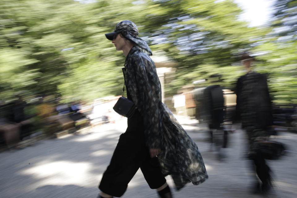 A model wears a creation as part of the Fendi men's Spring-Summer 2020 collection, unveiled during the fashion week, in Milan, Italy, Monday, June 17, 2019. (AP Photo/Luca Bruno)