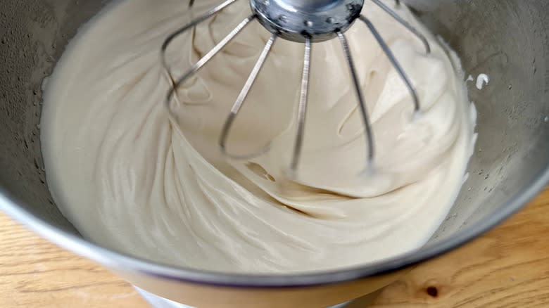 Egg whites and honey whipping in mixer