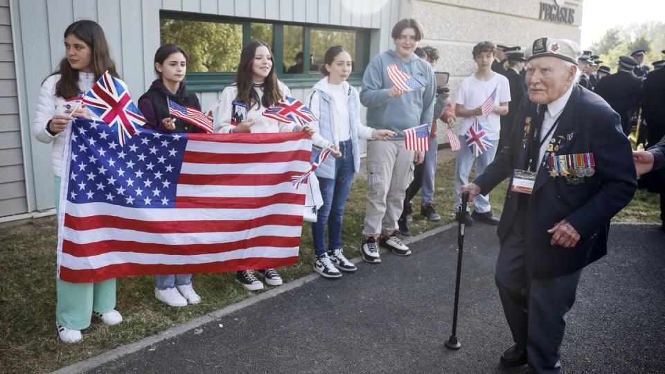 Children greet war veterans arriving for ceremony at the Pegasus Bridge memorial in Benouville, Normandy, Monday June 5, 2023. (Thomas Padilla/AP)